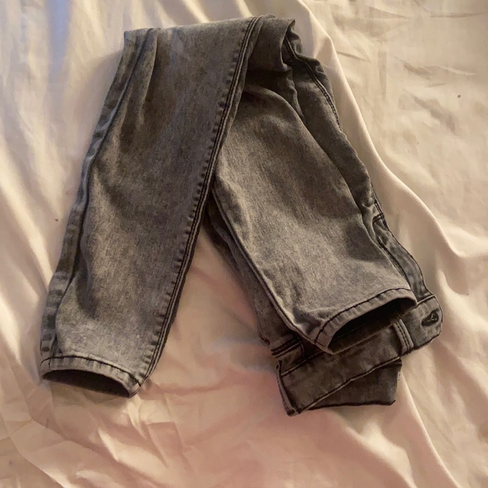 grey jeans.